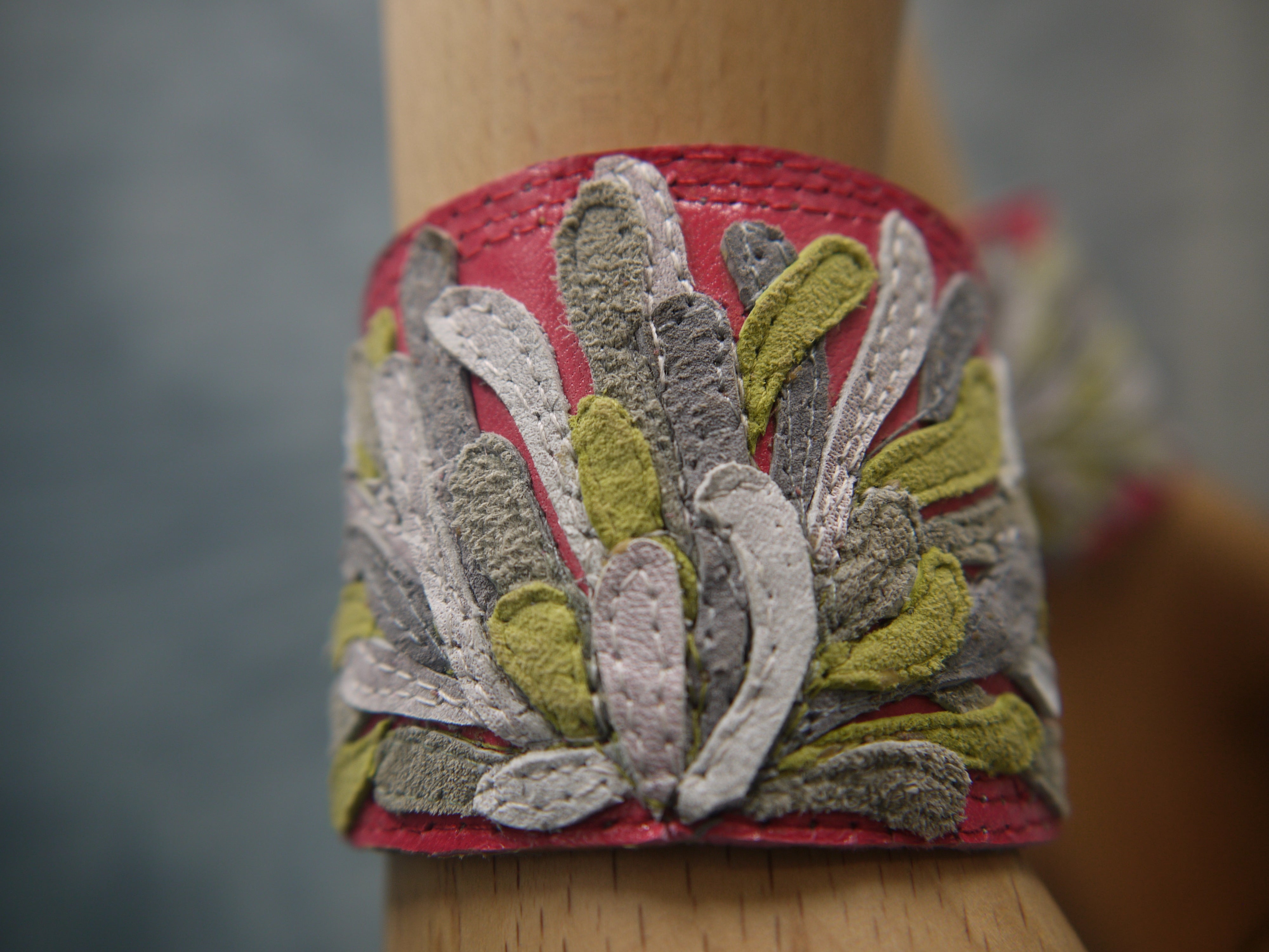 Chysanthemum Leather Cuff in hot pink with hand cut petals in pale grey, white, green petals , one-of-a- kind, unique, made in Italy by designer-makers